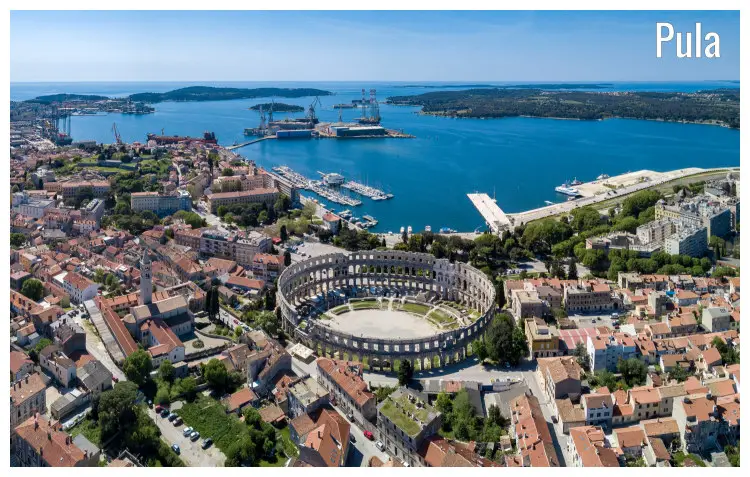 The Pula Arena, Croatia, with a view of the vast sea and islands The Pula Arena, Croatia, with a view of the vast sea and islands